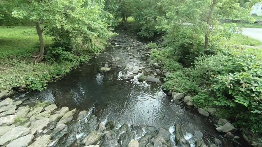 Traversing The Monoshone Creek in Wissahickon Valley Park, Part of Fairmount Park System, in Philadelphia Pennsylvania