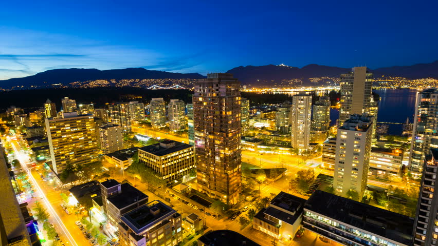 Ultra High Definition Time Lapse Movie of Long Exposure Traffic Lightrails in Downtown City of Vancouver BC British Columbia Canada at Blue Hour at Night 4096x2304