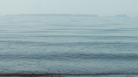 Calm waves on the North shore of Lake Superior. With audio.