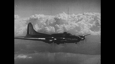 1950s: B-17 flies through the air. B-24 takes off, drops bombs. Bombs hit plane wing, plane bursts into flames, crashes. Flying bomb sits on launch pad.