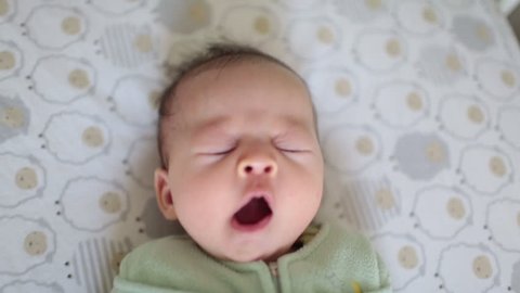 Sleepy Baby with Big Yawn