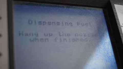 Close up of fuel monitor as a gas tank is filled