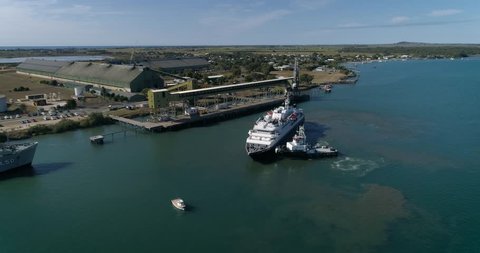 Burnett Heads, Queensland / Australia - June 2018 - Aerial Footage of the Silver Discoverer coming into the Port of Bundaberg