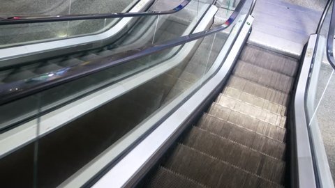 View of escalator while moving up and down 