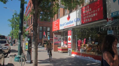 CHINATOWN, DUNDAS SPADINA, TORONTO, CANADA - CIRCA JUNE 2018: Daily life shots of the neighbourhood, stores, signs, markets, restaurants and tourists gift shops known as Chinatown, Dundas and Spadina.