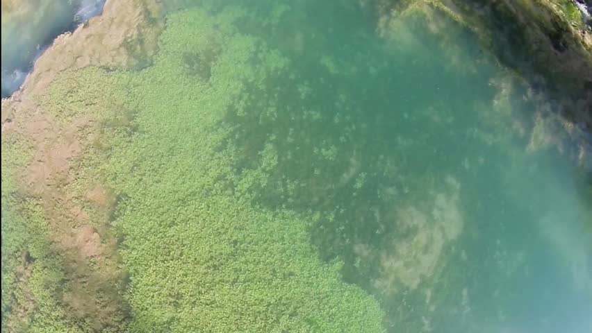 Water stream and waterfall in Grand Canyon at autumn sunny day. Aerial view