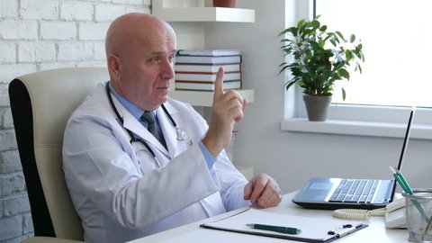 Doctor Listen and Make No Hand Gestures in Medical Cabinet