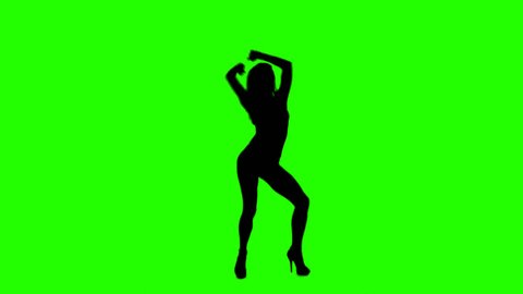 Beautiful Slim Girl Dancing Slowly On a Green Background. Attractive Female Silhouette with Alpha Channel.