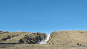 The beautiful Skógafoss waterfall on the south of Iceland. Wide angle lens time lapse video.