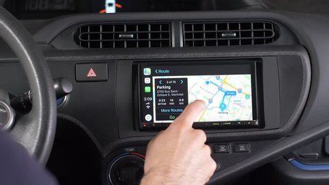 MONTREAL, CANADA - June 2018 :  a car touchscreen, using the navigation GPS maps of Apple CarPlay