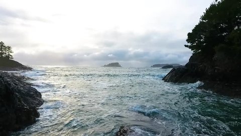 slow motion of waves rolling in at Crystal cove near Tofino Vancouver Island