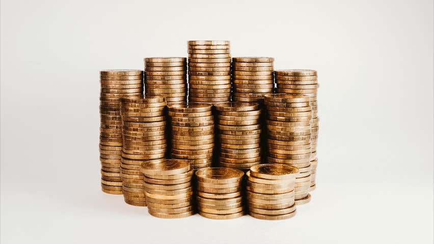 Stop motion reduction of a pile of gold coins, reduced investment and reduced profits on a white isolated background. Royalty-Free Stock Footage #1012621856