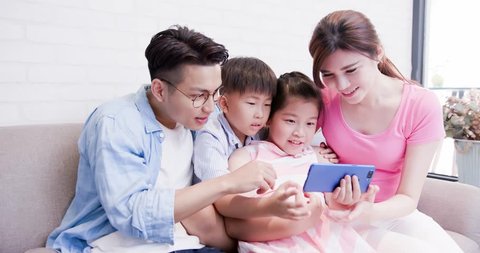family use phone watch movie happily at home
