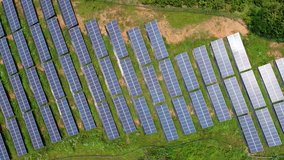 aerial video of solar power panels on hillside,green energy 