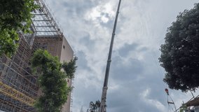 Crane Lifts Construction Materials Time Lapse video