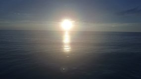 Sunset over ocean. Drone video footage.  