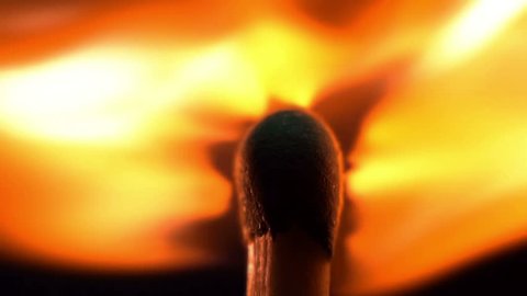 Cinemagraph of beautiful burning flame.Macro extreme close up shot of a burning wooden match. Looped