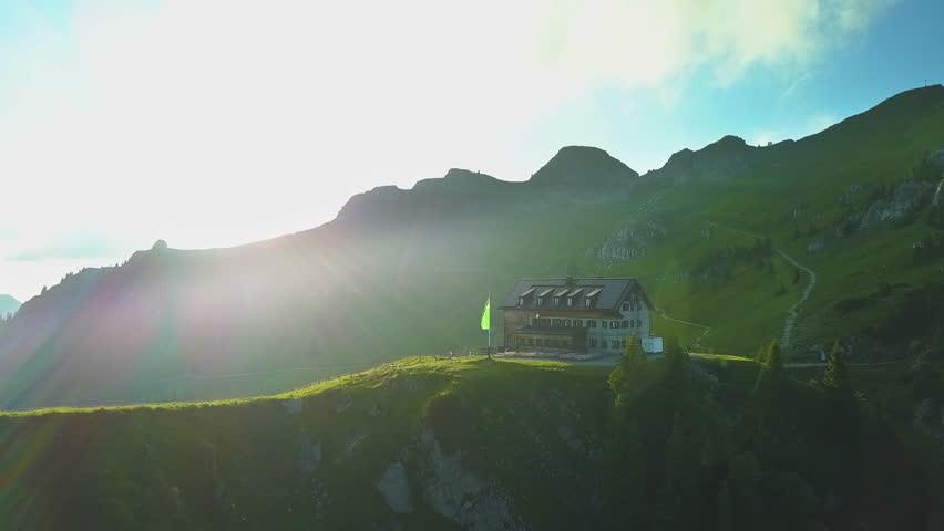 Epic sunset Rotwandhaus alpine hut Bavaria Germany aerial flight - 4k UHD