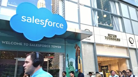 New York, New York, USA - June 22, 2018: People walk by the Salesforce Tower on 6th Avenue.