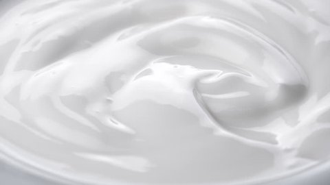 Closeup shot of mixing yogurt Rotating
