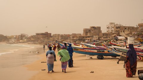 Senegal, Africa, June 2018. Beach with colorful fishing boats in Dakar.