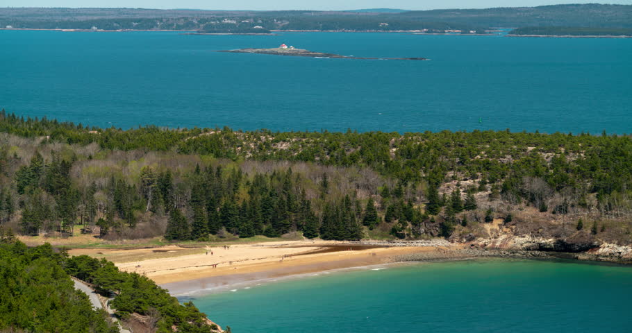 People Walking Sand Beach In Acadia National Park, Maine