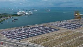 Container terminal time lapse video with zoom out at Singapore. - Powered by Shutterstock - Get 15% off with code: PIKWIZARD15