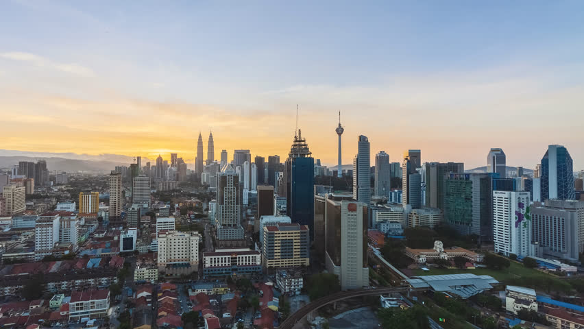 Time lapse: Beautiful Kuala Lumpur city view during dawn overlooking the city skyline from night to day. Full HD 1080p | Shutterstock HD Video #1012717106