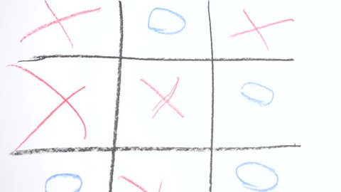 Slow motion. 4k, close-up, top view. Tic Tac Toe blue with a red pencil. male and female hand. the concept of rivalry between a man and a woman.