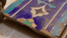 A close up shot of a ruined tile. - Powered by Shutterstock - Get 15% off with code: PIKWIZARD15