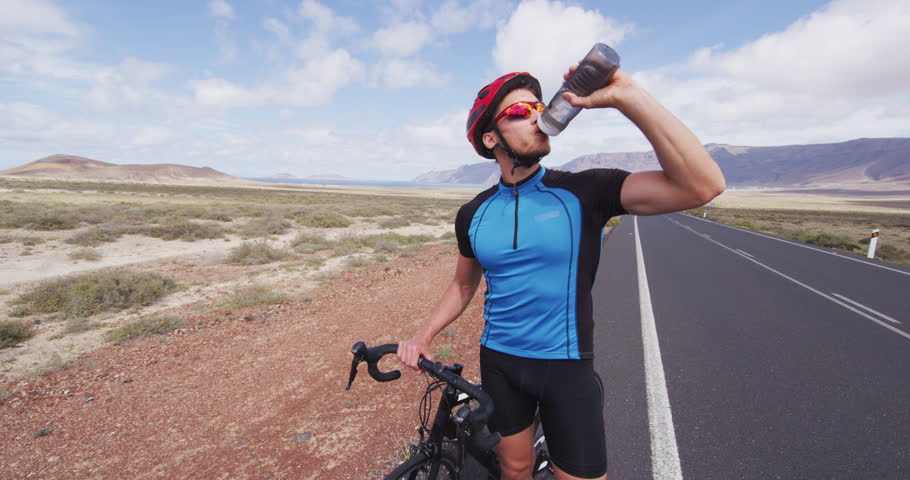 cyclist drinking water