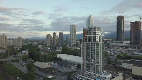 Aerial view of Residential Buildings in Brentwood during a vibrant sunrise. Taken in Burnaby, British Columbia, Canada.