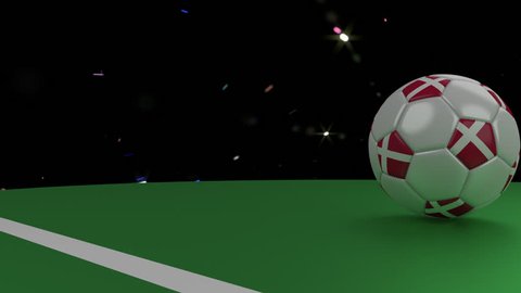 Soccer ball with the flag of Denmark crosses the goal line under the salute, 3D rendering