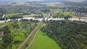 Gauja river railroad bridge Latvia aerial drone top view 4K UHD video 