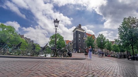 Amsterdam, Netherlands - June 1, 2018. Hyperlapse Timelapse with Amsterdam City Center Beautiful Architecture Details and Moving Clouds