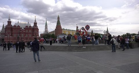 14.06.18: 4K high quality sunny summer day video of soccer football fans and locals celebrating in central Moscow streets near Red Square and Kremlin on FIFA World Cup opening day in Russian capital