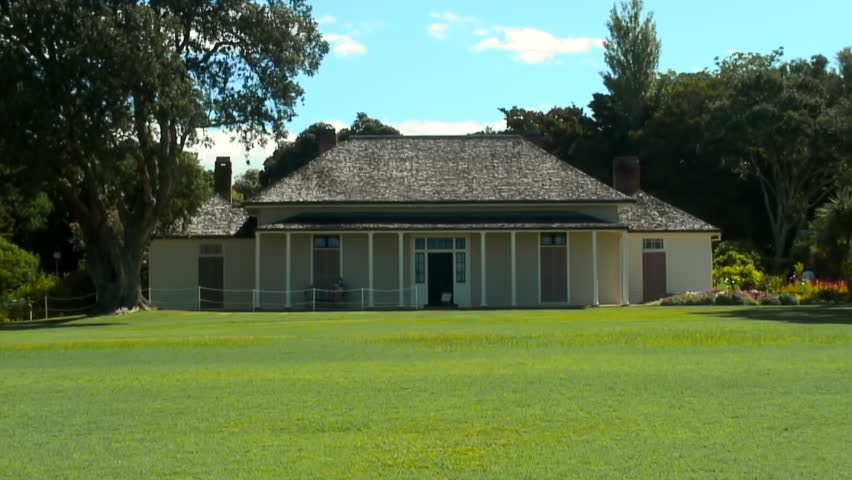 Tidy Little House across a Perfect Green Lawn