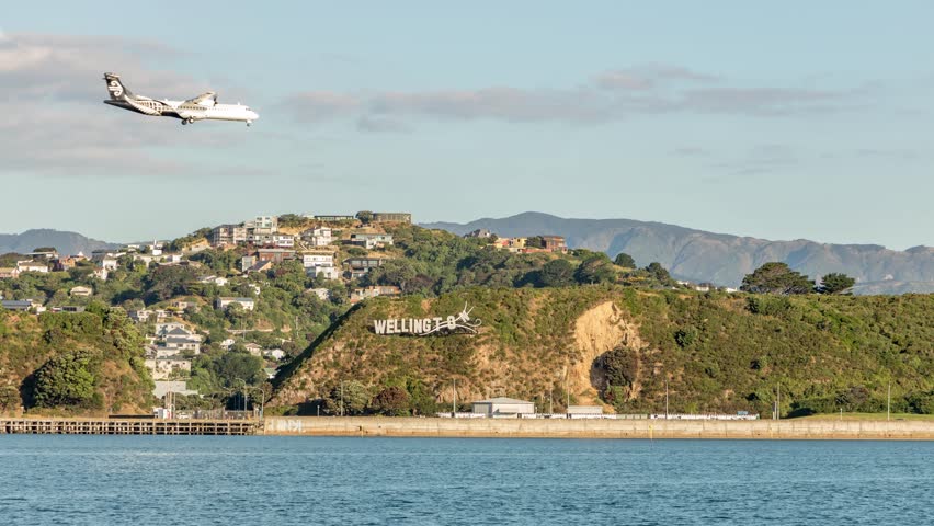 Time lapse, Wellington New Zealand airport sign at sunset.