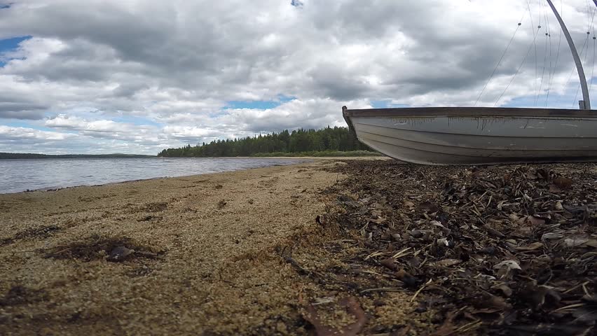 Old boat at a sandy beach