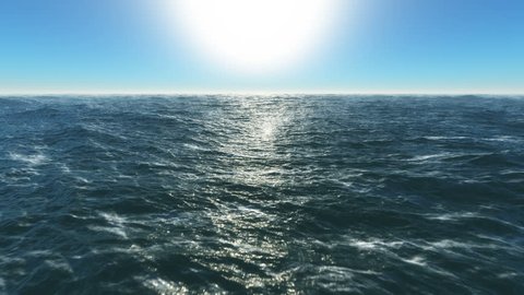 Ocean fly over,4k high speed animation just above the ocean waves facing the sun . 3d rendering