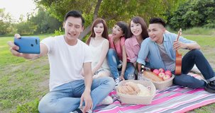 people selfie happily in the outdoor and go on picnic