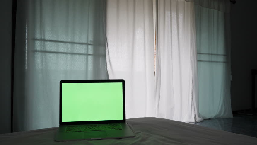 4K Asian man walking to open the curtain with the breeze, looks outside