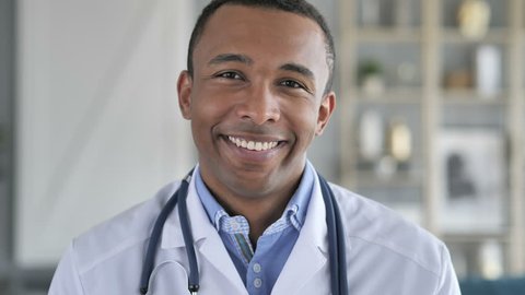 Portrait of Smiling Confident African-American Doctor