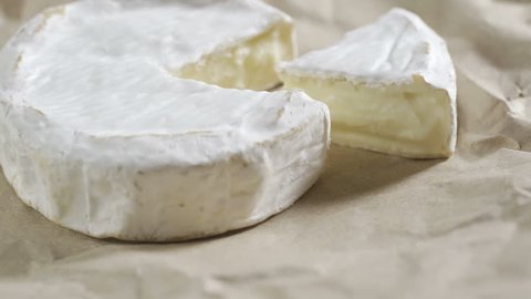 Portion of rotating creamy Camembert as detailed 4k footage