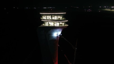 Airport, Air Traffic Control Tower and Airfield at Night.