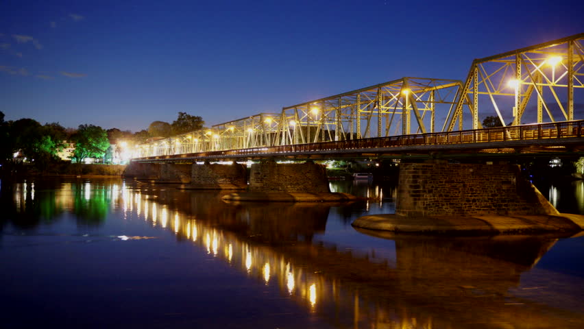 Night time-lapse of the New Hope-Lambertville Bridge that spans the Delaware River on the border of Pennsylvania and New Jersey.