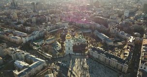 A bird's eye view, panoramic video from the drone in 4K to the Saint Sophia's Cathedral, Sofiyivska Square in the city of Kiev, Ukraine. People on the square on Easter days.