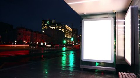 Night bus station with billboard. White blank screen.