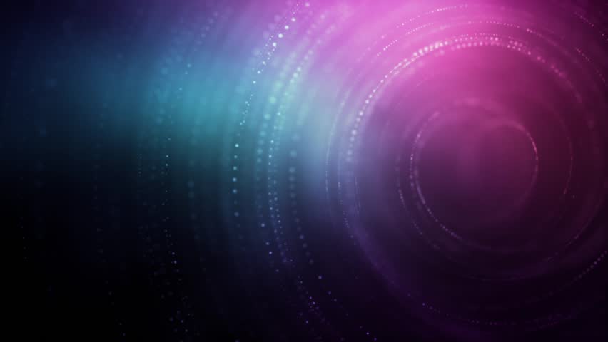 Abstract particles background animation loop with a spiral particle form rotating over a colorful ambient background environment., a Backgrounds & Wallpaper Video by Jonathan Litchfield