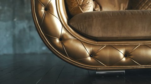 Elegant saturated glossy gold leather texture of sofa chair, Brown leather background
